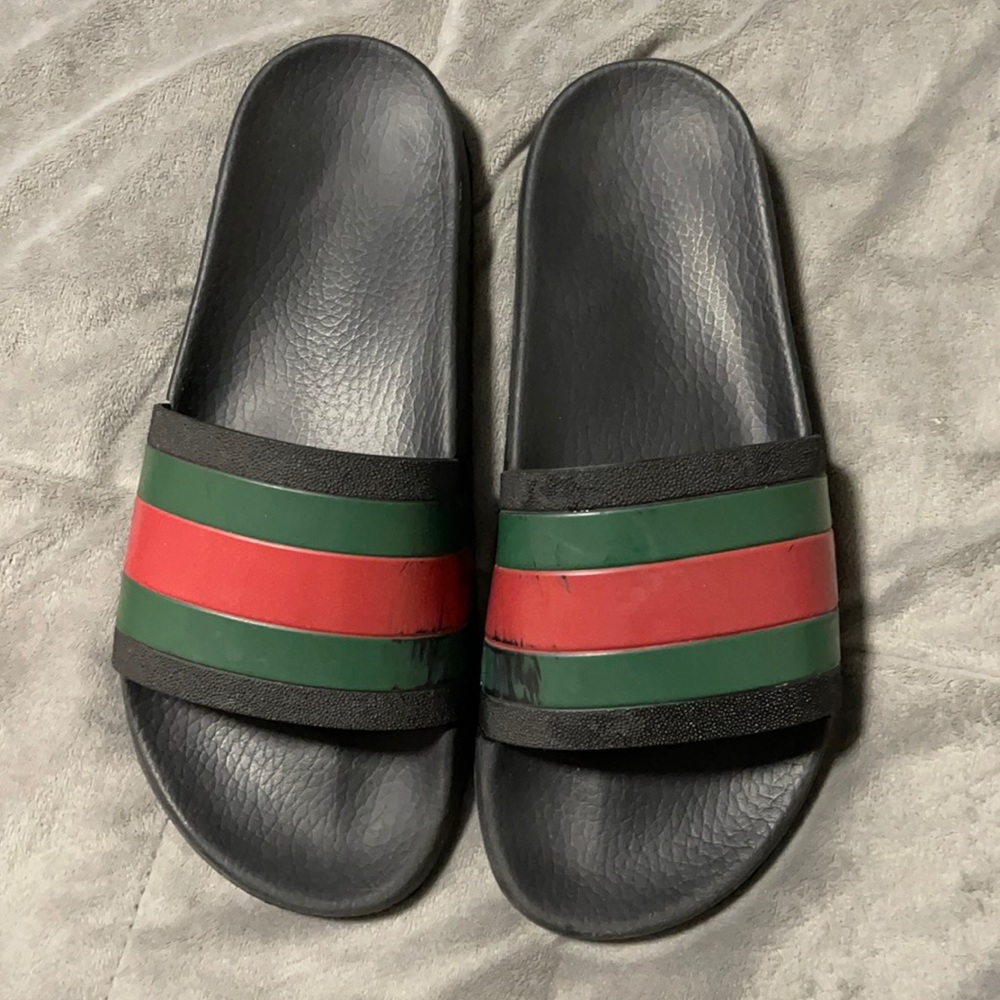 Men’s authentic Gucci slides.